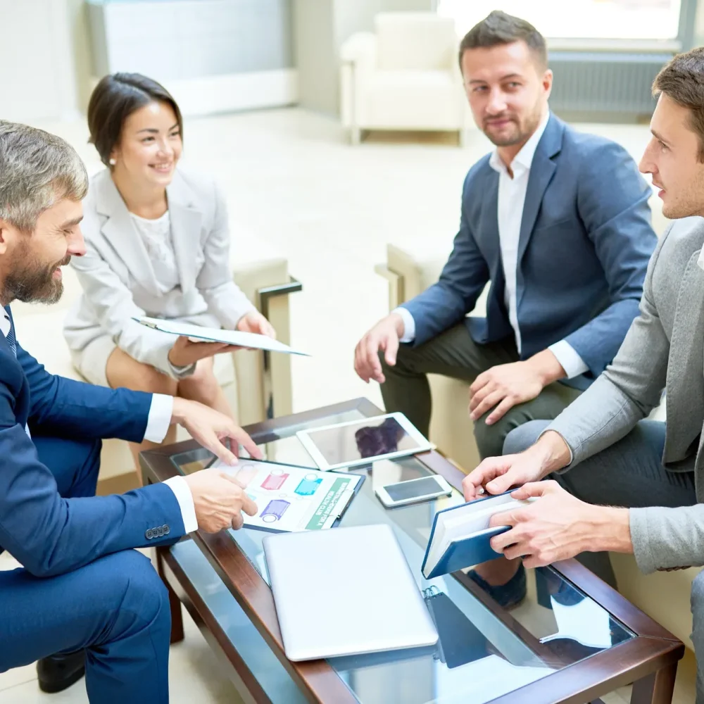 team-of-cheerful-business-people-in-meeting-2